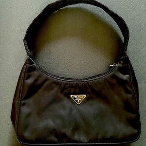 Beautiful small Prada bag never used without tags
